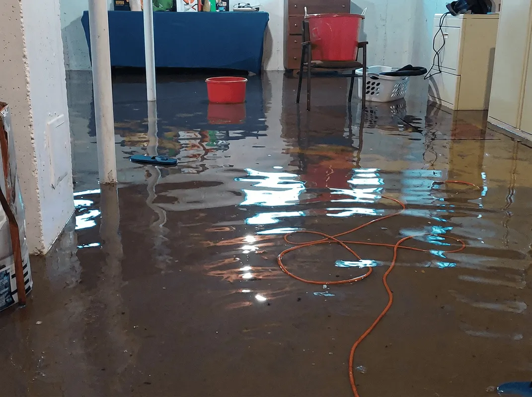 Basement with boiler, cabinets and washing machine completely flooded in Peoria, IL